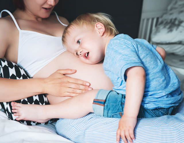 Pregnant lady with little boy