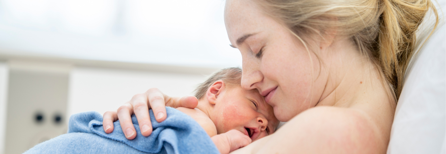 White blond woman with her newborn